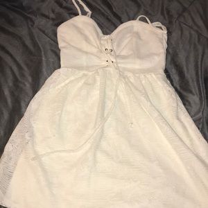Women’s white small dress.